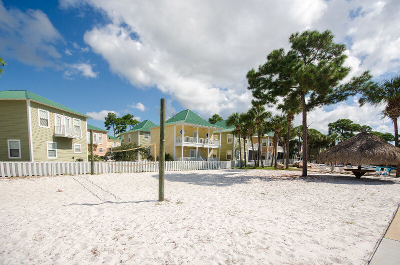 Play volleyball on a sand court at Purple Parrot Resort in Perdido Key